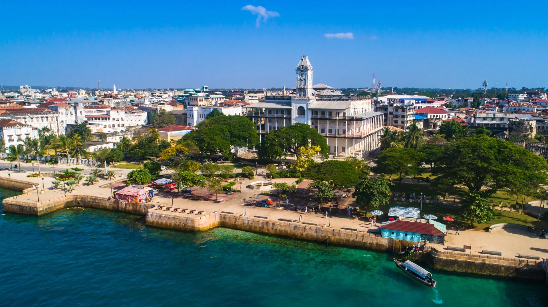 Private Zanzibar tour with guide and couple exploring historic Stone Town